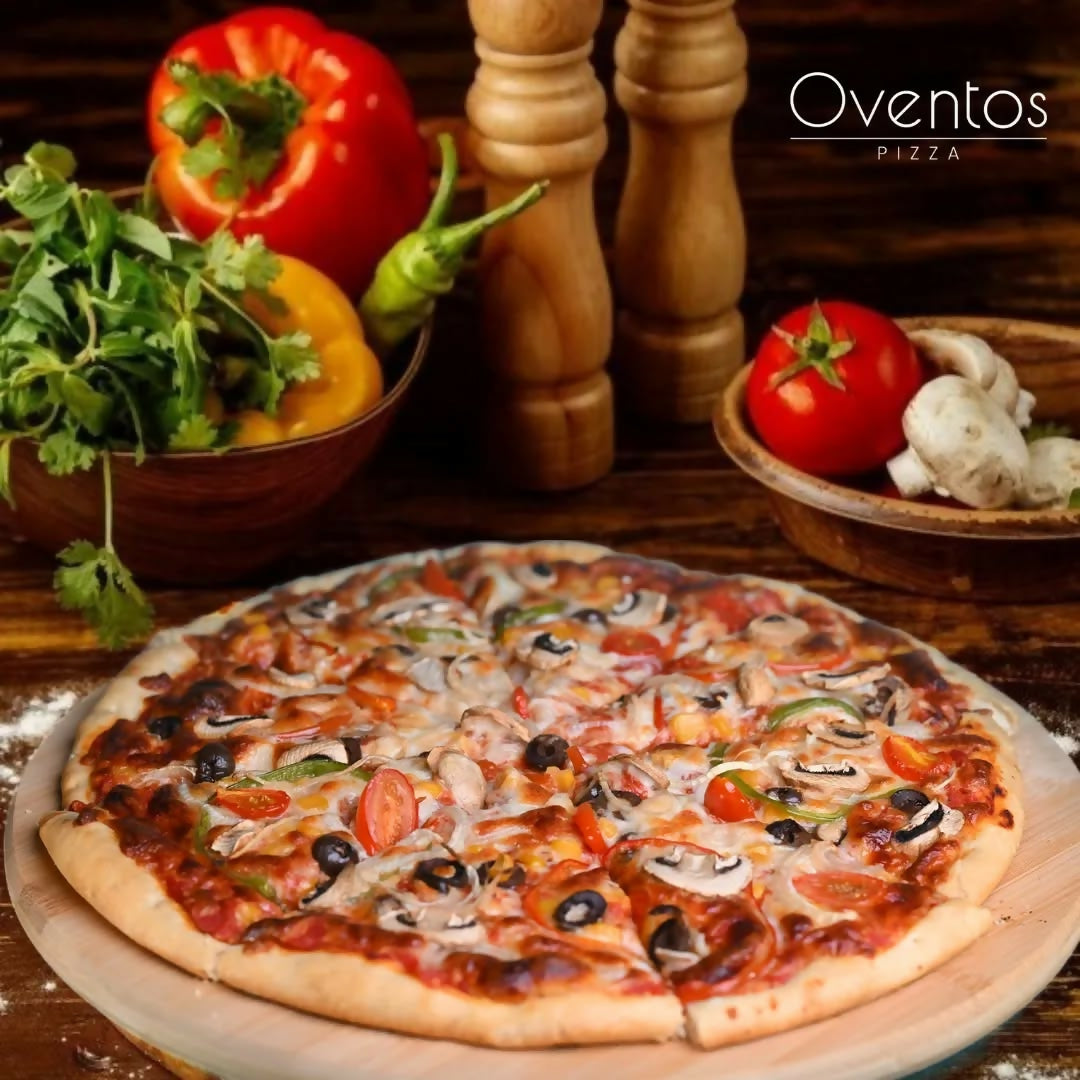 Serving up a slice of veggie heaven Fresh, flavorful, and 100% vegetarian goodness! Who's ready for a bite#pizza #PizzaTime #vegetarian #pizzalover