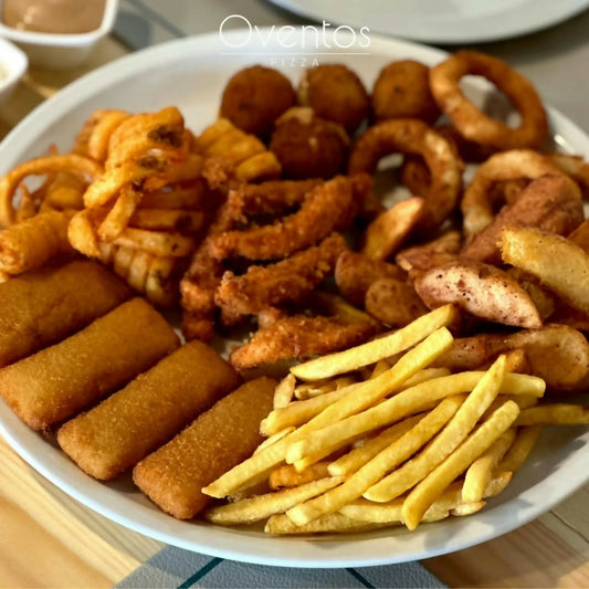 Snack game strong!   Crispy curly fries, potato wedges, chicken tenders, mozzarella bricks, cheese balls, and onion rings—all paired with our special dips   The ultimate snack platter for your cravings!#FoodGoals 